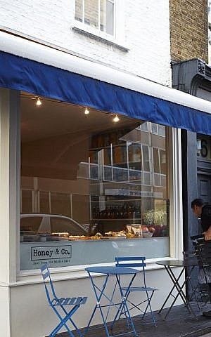 Situated at the far end of Warren Street in central London, Honey & Co. occupies part of a four-story, whitewashed townhouse structure, with the restaurant on the ground level and the kitchen down below. (© Patricia Niven 2015)