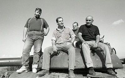 Avigdor Kahalani (right) and his crew pictured years later on a Syrian tank (Courtesy: IDF)