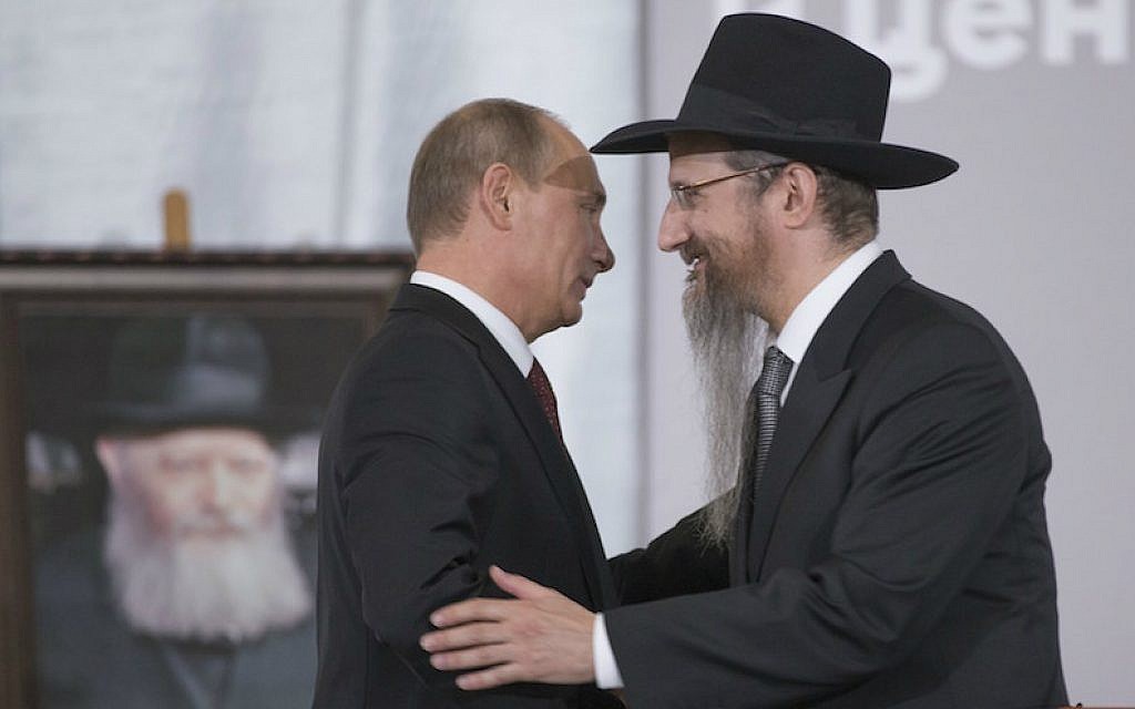 Russian President Vladimir Putin, left, is greeted by Russia’s Chief Rabbi Berel Lazar in Moscow, June 13, 2013. (Alexander Zemlianichenko/AP Images/via JTA)