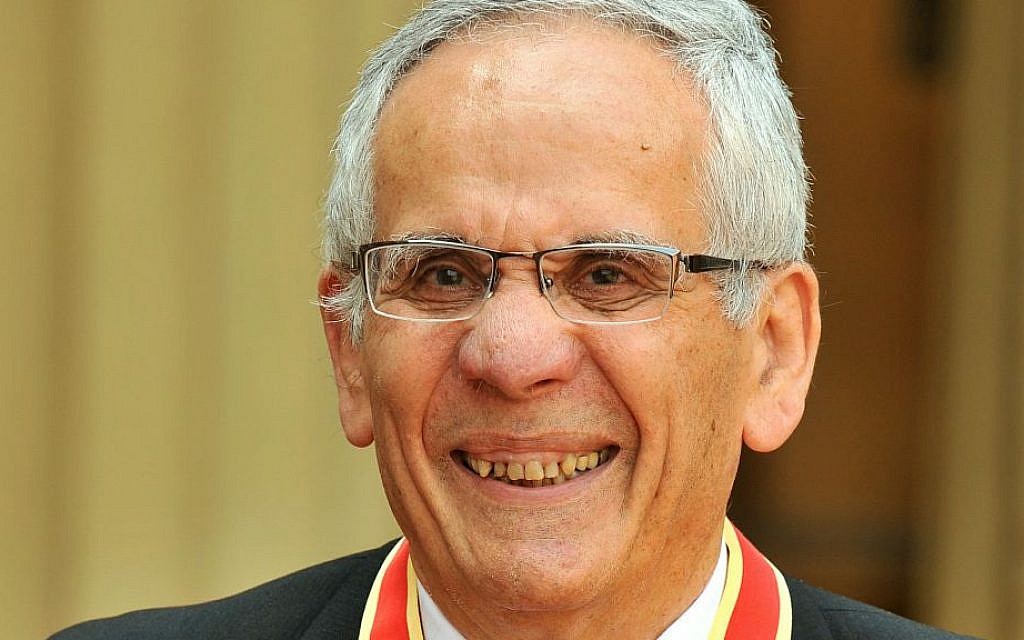 Sir Erich Reich poses with his medal after being awarded a Knighthood by Prince Charles for raising millions of pounds for charity at Buckingham Palace on May 21, 2010 in London, England. (Photo by John Stillwell - WPA Pool/Getty Images/via AP)