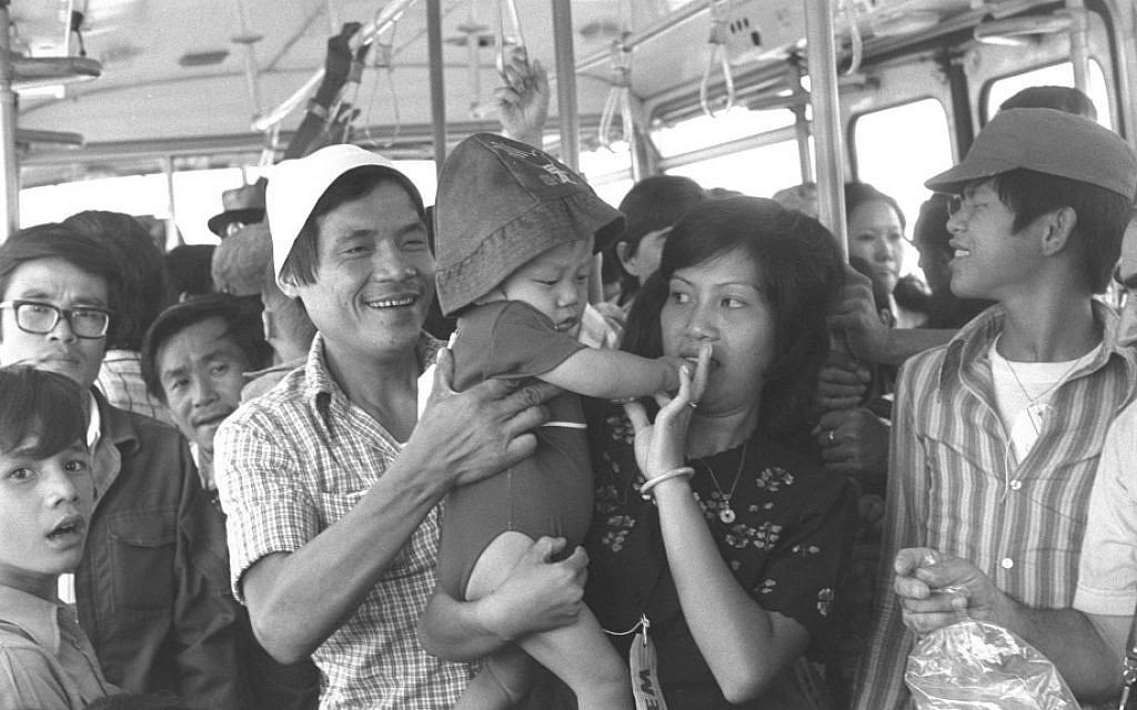 Newly arrived refugees from Vietnam ride the bus to the Ben Gurion Airport arrivals terminal, June 26, 1977 (Moshe Milner/GPO)