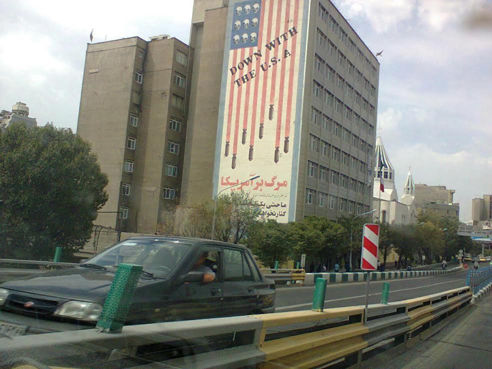 The Stars and Stripes as skulls and bombs in downtown Tehran (Times of Israel staff)