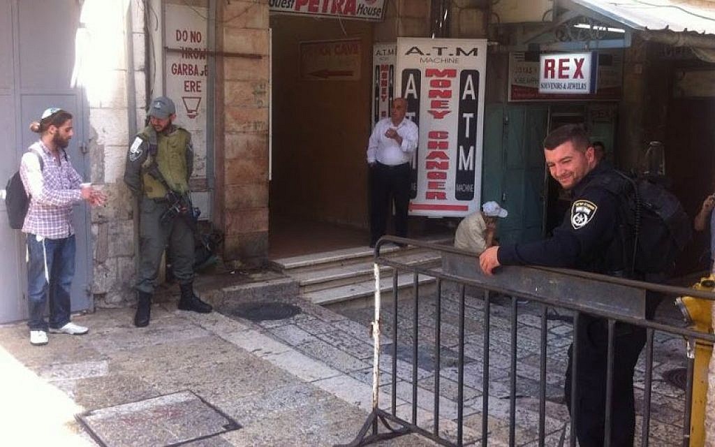 The entrance to the Souk of the Old City in Jerusalem on Sunday, October 4, 2015. The street, usually bustling with tourists, are almost deserted, after the government decided in an unprecedented step to ban entry to Palestinians who are not residents of the city. Other store owners closed down shop in protest at the move. (Tamar Pileggi/The Times of Israel)