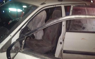 The car in which Israeli couple Naama and Eitam Henkin were shot dead in a terror attack near the West Bank settlement of Itamar on Thursday, October 1, 2015. (Courtesy United Hatzalah)