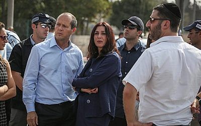 Jerusalem Mayor Nir Barkat and Culture Minister Miri Regev seen at the scene of a stabbing attack in front of the Police National Headquarters in Jerusalem on October 12, 2015. (Hadas Parush/Flash90)