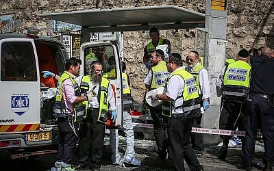 The site of a attack where a terrorist rammed his car into pedestrians and then got out and stabbed others, injuring at least 5 people, killing one, on Malchei Yisrael Street, in Jerusalem. October 13, 2015. (Hadas Parushl/FLASH90)