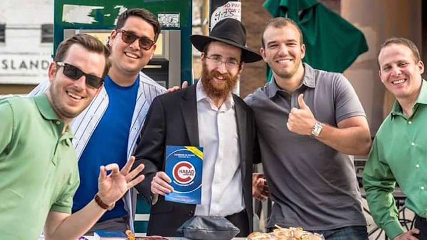 Rabbi Kotlarsky has started a tefillin tradition outside Chicago’s Wrigley Field (Chabad.org)