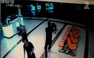 Security camera footage showing an Eritrean man being shot in the Beersheba central bus station on October 18, 2015, after he was thought to be a terrorist. (screen capture: Channel 2)