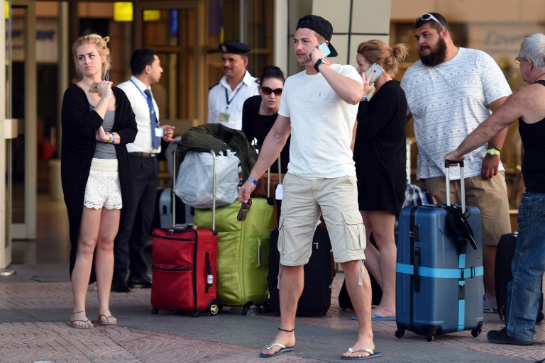 British tourists arrive at the airport in Egypt's Red Sea resort of Sharm el-Sheikh on November 6, 2015. (Mohamed el-Shahed/AFP)