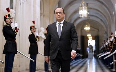 French President Francois Hollande arrives for a speech at an exceptional joint gathering of Parliament in Versailles on November 16, 2015, three days after 129 people were killed in the worst terrorist attack in France's history (AFP PHOTO/POOL/MICHEL EULER)