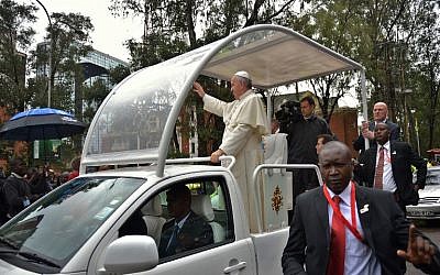 Pope Francis arrives to celebrate a giant open-air mass at the University of Nairobi, November 26, 2015. (Photo by AFP Photo/Tony Karumba)