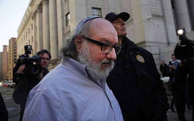 Jonathan Pollard, the American convicted of spying for Israel, leaves a New York courthouse following his release from prison after 30 years, on November 20, 2015 in New York. (Spencer Platt/Getty Images/AFP)
