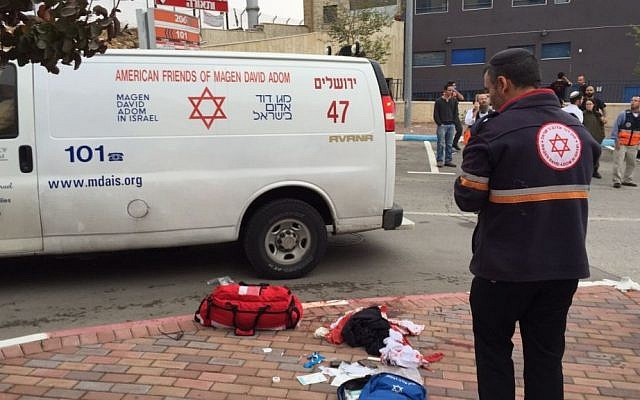 Paramedics on the scene of a stabbing attack in the Sha'ar Binyamin industrial park in the West Bank on Nov. 6, 2015. (Magen David Adom)