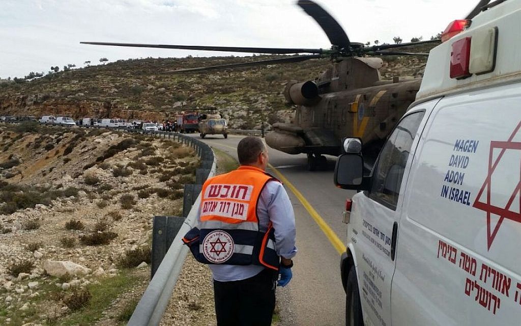Illustrative: Victims of a bus accident are loaded into helicopters in order to get them to hospitals as quickly as possible near Kochav HaShachar in the West Bank on November 26, 2015. (Magen David Adom)