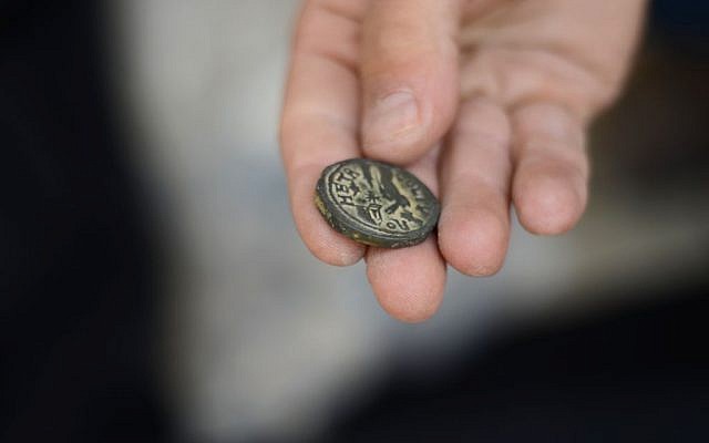 An ancient Roman coin minted in Tyre in the third century CE confiscated from an antiquities dealer in northern Israel suspected of illegal sale of artifacts on November 24, 2015. (Israel Antiquities Authority)