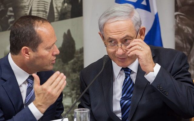 Prime Minister Benjamin Netanyahu (right) with then-Jerusalem mayor Nir Barkat in Jerusalem, on May 28, 2014. (Emil Salman/POOL/Flash90)