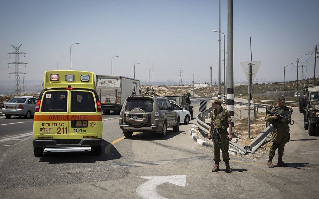 An ambulance at the scene of a stabbing attack on Route 443 on August 15, 2015. (Hadas Parush/Flash90)