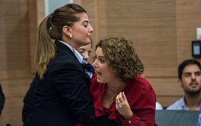 File: Meretz MK Michal Rozin is escorted out from a debate regarding the Israeli Jewish anti-assimilation "Lehava" organization at the Interior Affairs committee meeting in the Israeli parliament on November 10, 2015. (Yonatan Sindel/FLASH90)