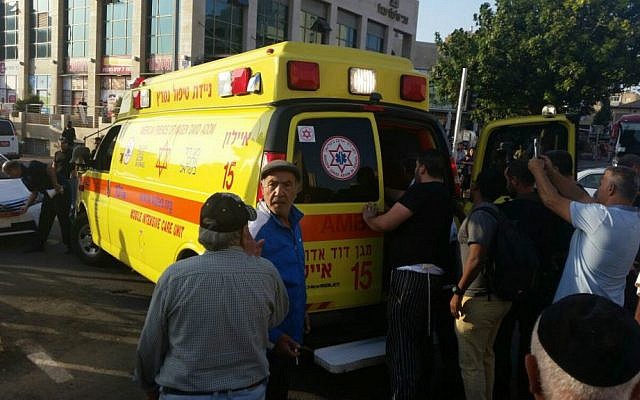 An ambulance evacuates a wounded Rishon Lezion resident after a Palestinian stabbing attack in the city, November 2, 2015. (MDA)