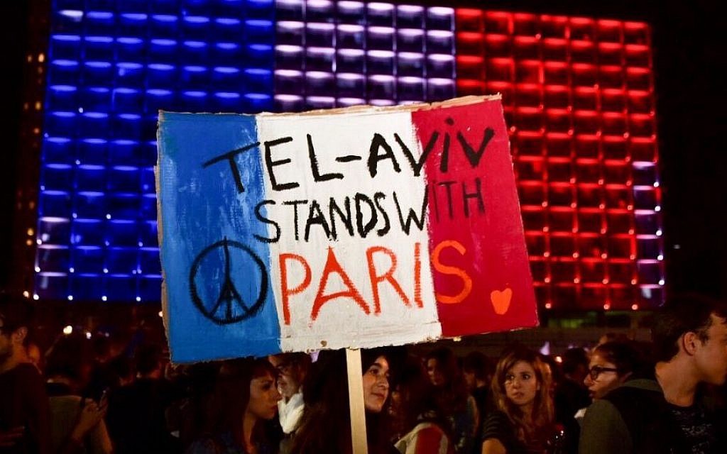Paris attacks: People around the world #PrayforParis as nearly 130