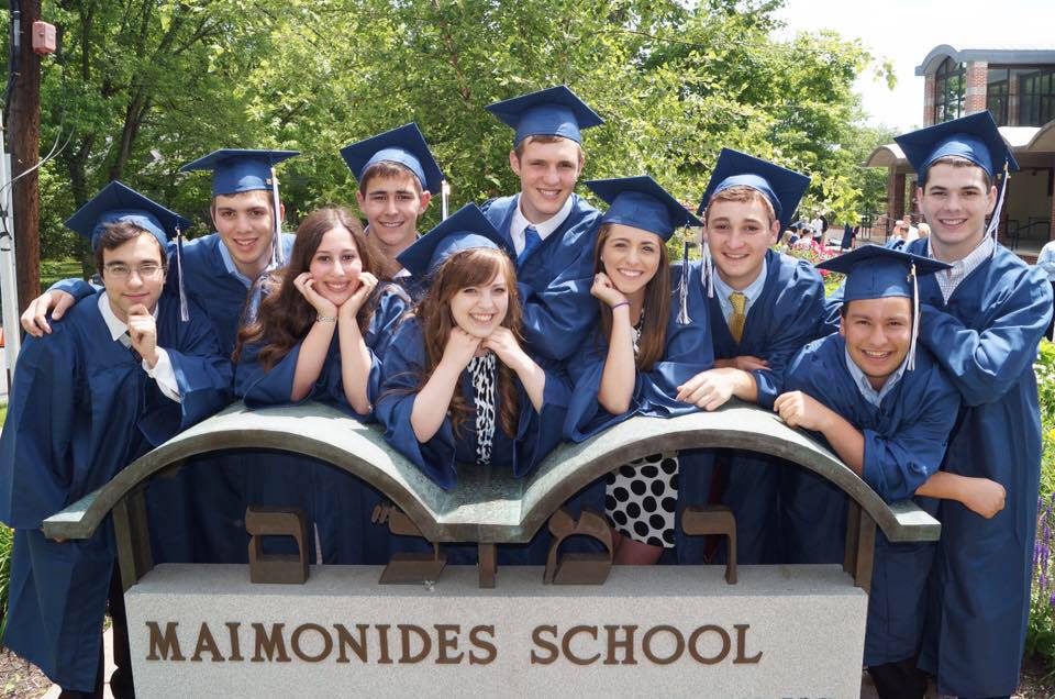 Ezra Schwartz, third from right, was murdered by a Palestinian terrorist south of Jerusalem on November 19, 2015. At the time, Schwartz was spending a gap year at a Beit Shemesh yeshiva. Here he poses with fellow Maimonides School graduates in May 2015, outside Boston. (Facebook)