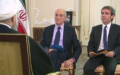 Iranian President Hassan Rouhani (left, seen from the back) interviewed by France 2 ahead of his visit to France, scheduled for 16-17 November 2015. (Screen capture France 2)