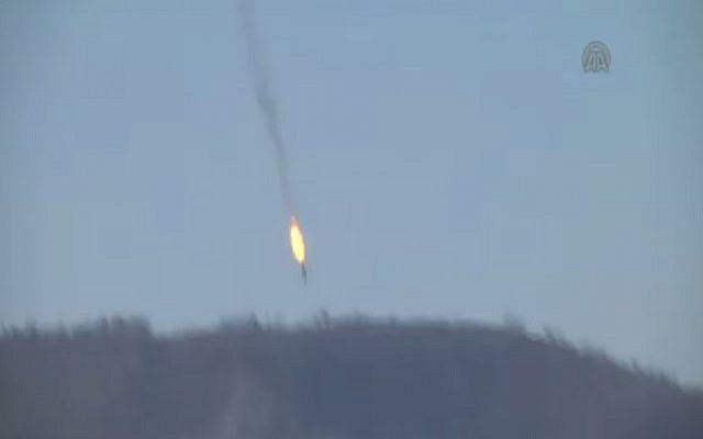 A Russian jet plunges to the ground after being shot down by Turkey near the border with Syria on November 24, 2015. (screen capture: Anadolu Agency)