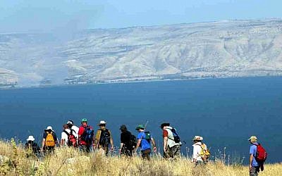 Hikers near the Sea of Galilee, Israel's largest freshwater lake (Yossi Zamir/Flash90)