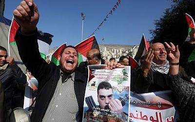 Palestinians chant slogans against Israel during a demonstration in support of late Lebanese terrorist Samir Kantar (portrait) in the West Bank city of Nablus on December 21, 2015 (AFP / JAAFAR ASHTIYEH)