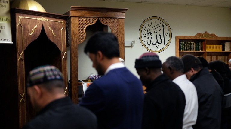 Illustrative image of American Muslim men praying at a mosque in Jersey City, New Jersey, on December 7, 2015. (AFP PHOTO/JEWEL SAMAD)