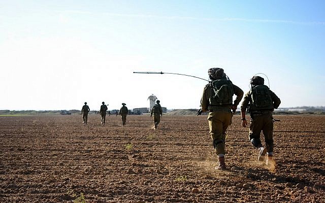 Illustrative photo of an IDF exercise near the Gaza Border on November 19, 2014. (Amit Shechter/IDF Spokesperson's Unit/Flickr)