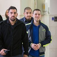 Yitzhak Gabai (right), a member of the extreme-right Lehava organization, at the Jerusalem District Court on November 10, 2015. (Yonatan Sindel/Flash90)