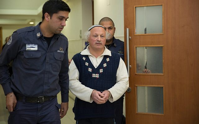 Daniel Pinner is brought to the Jerusalem Magistrate's Court after being arrested on suspicion of hate and racist incitement, at a wedding celebration that came to be known as the 'hate wedding,' on December 29, 2015. (Hadas Parush/Flash90)