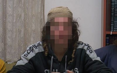 One of the suspects arrested in connection with the Dawabsha murder, December 3, 2015. Under a court-issued gag order, the identities of the suspects cannot be revealed. (Screen capture)