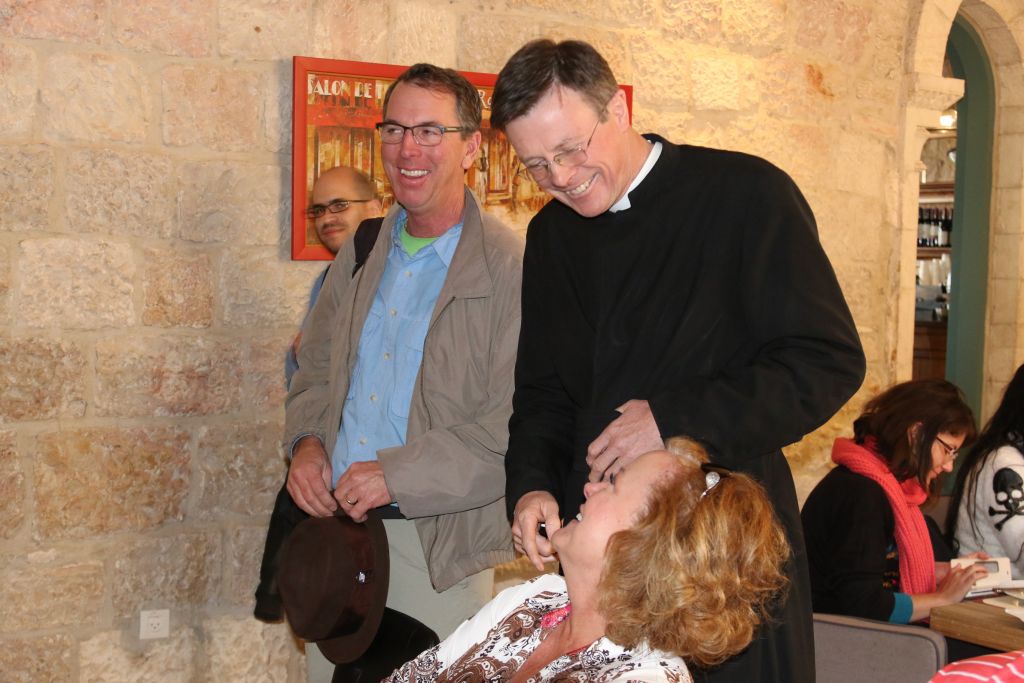 Father Eamon Kelly greets guests at Notre Dame (Shmuel Bar-Am)