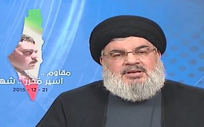 File: Hezbollah leader Hassan Nasrallah discusses the death of terrorist Samir Kuntar, allegedly at the hands of Israel, in a televised speech from Beirut on December 21, 2015. (screen capture: YouTube)