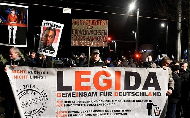 Protesters from the PEGIDA movement (Patriotic Europeans against the Islamization of the Occident) march during a rally in Leipzig, German, on January 11, 2016. (AFP/Tobias Schwarz)
