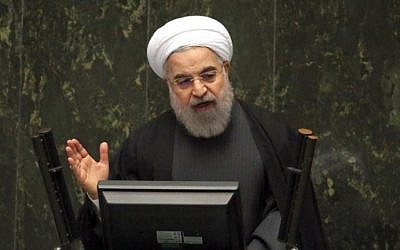 Iranian President Hassan Rouhani delivers a speech to parliament in the capital, Tehran, on January 17, 2016, after sanctions were lifted, under Tehran's nuclear deal with world powers. (AFP/Atta Kenare)