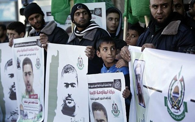 File: Palestinian supporters of the Hamas terror group mourn Nashat Milhem, an Arab Israeli who murdered three people in a Tel Aviv shooting spree January 1, 2016, during a rally in Gaza City on January 9, 2016. (AFP/Mahmud Hams)