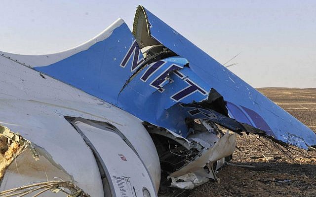 The tail of a Metrojet plane that crashed in Hassana, Egypt carrying 224 people on Saturday, October 31, 2015. (Suliman el-Oteify/Egyptian Prime Minister's Office via AP)