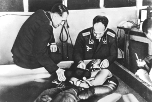Forced cold water immersion experiment claimed to be at Dachau concentration camp, with a prisoner who was forced to participate. Note the floating blocks of ice. (Wikipedia/BMJ: British Medical Journal/fair use)