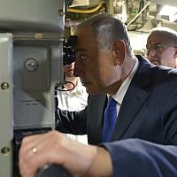 Prime Minister Benjamin Netanyahu aboard the new submarine 'Rahav' at the Israeli navy base in Haifa, on January 12, 2016. (Kobi Gideon/GPO)