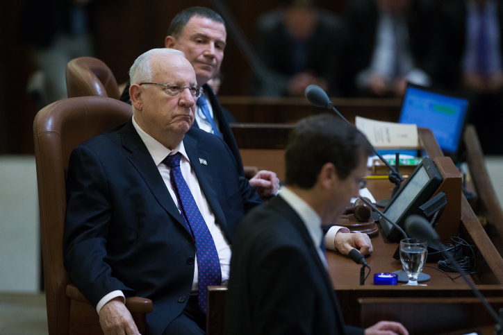 Knesset Speaker Yuli Edelstein (top), President Reuven Rivlin (center) and opposition leader Isaac Herzog attend a special anniversary session of parliament, on January 19, 2016. (Photo by Yonatan Sindel/Flash90) 