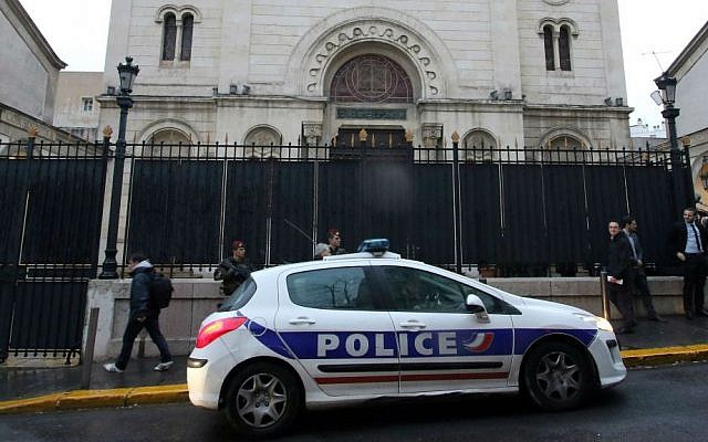 Illustrative. Police guard a synagogue during a visit by French Interior Minister Bernard Cazeneuve, in Marseille, southern France, Thursday, January 14, 2016. (AP Photo/Claude Paris)