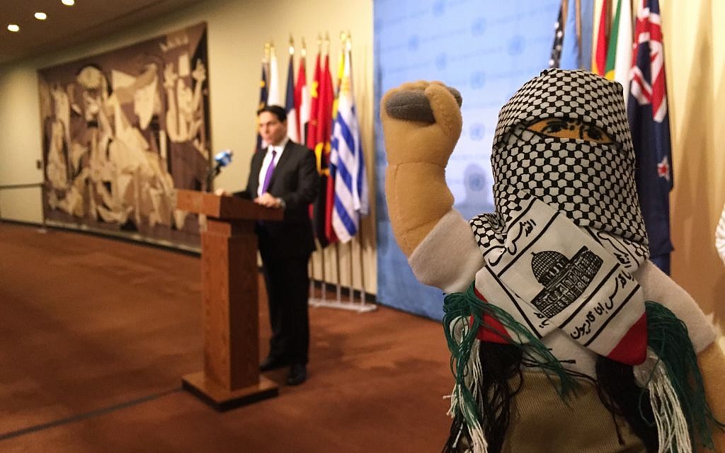 Israel's UN ambassador, Danny Danon, and his colleagues display what he calls 'terror dolls,' right, which he says are being used to teach hatred among Palestinian children, on Tuesday, January 26, 2016, at the UN (AP Photo/Cara Anna)