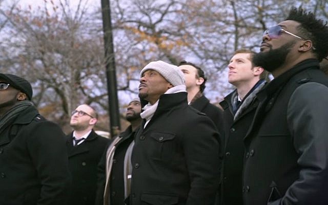 Members of the Maccabeats and Naturally 7 in 'Shed a Little Light' video. (YouTube)