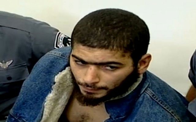 The suspect in the January 1, 2016, shooting attack in Tel Aviv, 29-year-old Nashat Milhem, seen after a 2007 arrest. (Channel 10 news)
