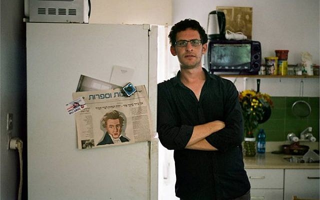 'Shtisel' co-writer Yehonatan Indursky in his Tel Aviv apartment, far from his childhood Haredi home in Givat Shaul in Jerusalem. (Courtesy Sam Spiegel)