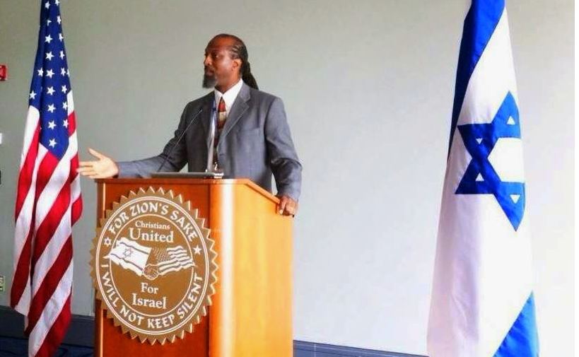 Pastor and pro-Israel activist Dumisani Washington speaks at a Washington, DC gathering of Christians United for Israel in 2013 (courtesy: CUFI)