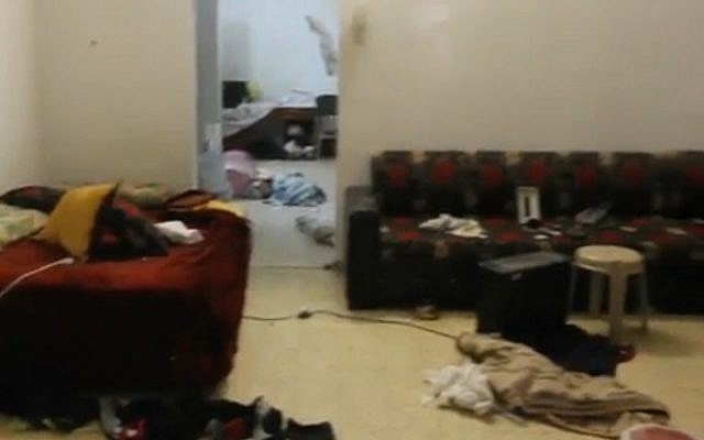 A still image from a video showing the inside purported Arara hideout of Tel Aviv gunman Nashat Milhem, a day after he was shot dead by security forces on January 8, 2016 (screen capture: Ynet)